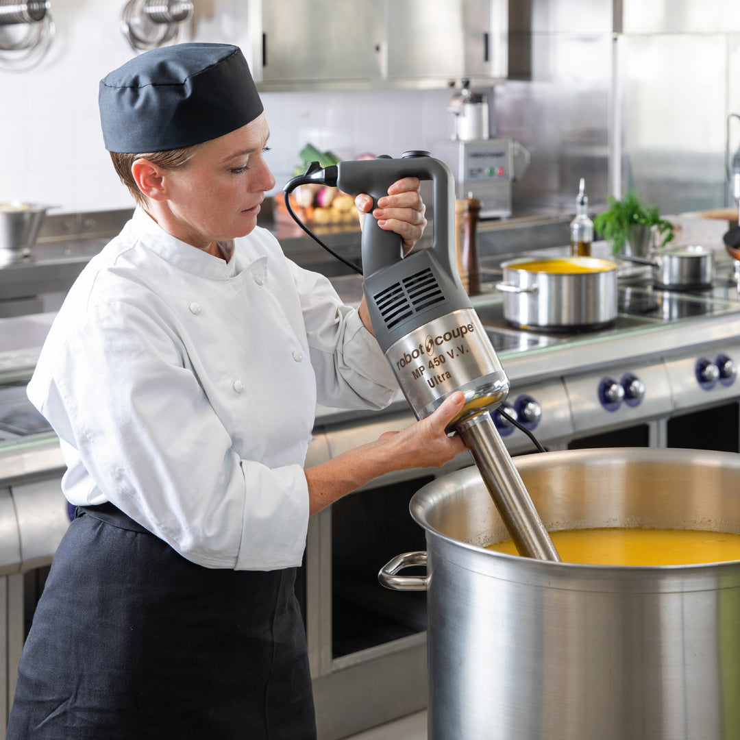 Robot Coupe MP450-VV Immersion Blender in use by a chef in a commercial kitchen