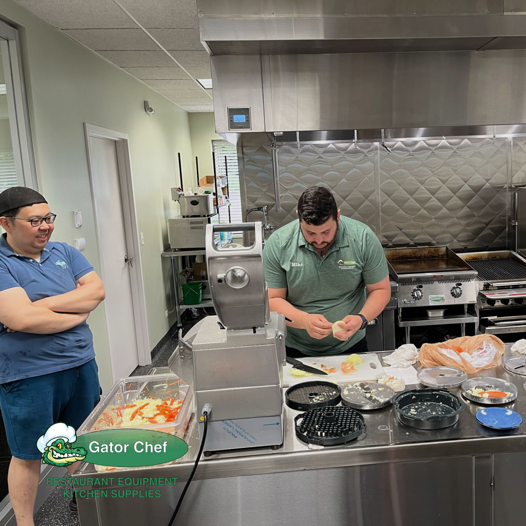 A customer with Gator Chef Equipment Specialist inside our commercial test kitchen