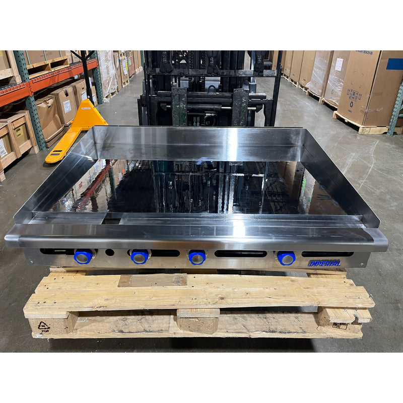 Front-focused ariel view of a USED 48” W x 30" D Thermostatic Commercial Griddle with 1" Thick Chrome Mirror Finish Flat Top Nat. Gas (Imperial ITG4830CG)