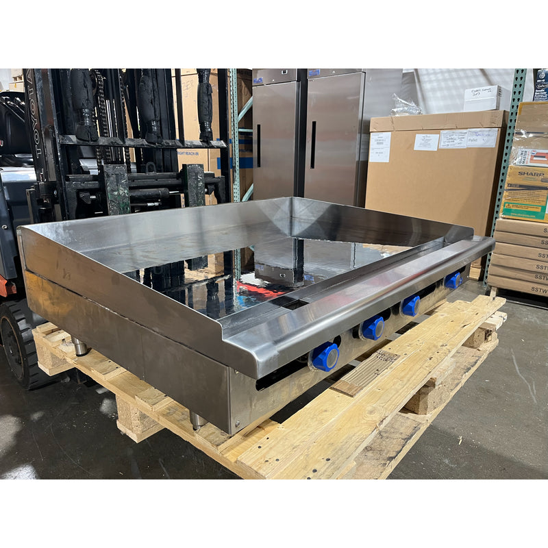 Side angle view of a USED 48” W x 30" D Thermostatic Commercial Griddle with 1" Thick Chrome Mirror Finish Flat Top Nat. Gas (Imperial ITG4830CG)
